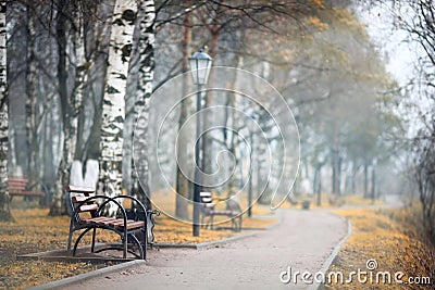 City â€‹â€‹alley autumn bench Stock Photo